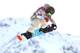 SOCHI, RUSSIA - FEBRUARY 09: Jamie Anderson of the United States competes in the Women's Snowboard Slopestyle Finals during day two of the Sochi 2014 Winter Olympics at Rosa Khutor Extreme Park on February 9, 2014 in Sochi, Russia. (Photo by Paul Gilham/Getty Images)