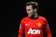 MANCHESTER, ENGLAND - JANUARY 28: New signing Juan Mata of Manchester United looks on during the Barclays Premier League match between Manchester United and Cardiff City at Old Trafford on January 28, 2014 in Manchester, England. (Photo by Michael Regan/Getty Images)