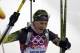 Slovakia's Anastasiya Kuzmina smiles after completing the women's biathlon 7.5k sprint, at the 2014 Winter Olympics, Sunday, Feb. 9, 2014, in Krasnaya Polyana, Russia. (AP Photo/Kirsty Wigglesworth)