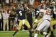 Notre Dame quarterback Everett Golson (5) works against Alabama during the first half of the BCS National Championship college football game Monday, Jan. 7, 2013, in Miami. (AP Photo/David J. Phillip)