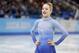 Gracie Gold of the United States leaves the ice after competing in the women's team free skate figure skating competition at the Iceberg Skating Palace during the 2014 Winter Olympics, Sunday, Feb. 9, 2014, in Sochi, Russia. (AP Photo/Darron Cummings, Pool)