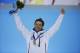 Men’s biathlon 10k sprint gold medalist Norway's Ole Einar Bjoerndalen celebrates on the podium during the medals ceremony at the 2014 Winter Olympics, Sunday, Feb. 9, 2014, in Sochi, Russia. (AP Photo/David Goldman)
