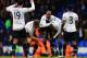 LONDON, ENGLAND - FEBRUARY 09: Jermain Defoe (C) of Tottenham Hotspur is carried on the shoulders of team mates Jan Vertonghen (L) and Emmanuel Adebayor (R) at the end of his final home game before joining Toronto FC following the Barclays Premier League match between Tottenham Hotspur and Everton at White Hart Lane on February 9, 2014 in London, England. (Photo by Shaun Botterill/Getty Images)