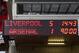 The scoreboard shows the final result as Liverpool beat Arsenal in their English Premier League soccer match at Anfield Stadium, Liverpool, England, Saturday Feb. 8, 2014. (AP Photo/Jon Super)