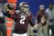 Texas A&M quarterback Johnny Manziel (2) looks for a receiver in the second half of the Chick-fil-A Bowl NCAA college football game against Duke Tuesday, Dec. 31, 2013, in Atlanta. (AP Photo/John Bazemore)
