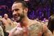 COMMERCIAL IMAGE - In this photograph taken by AP Images for WWE, WWE Champion CM Punk thanks the troops for their service during WWE’s 9th annual