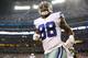 ARLINGTON, TX - DECEMBER 29: Dez Bryant #88 of the Dallas Cowboys runs off of the field in the second half against the Philadelphia Eagles at Cowboys Stadium on December 29, 2013 in Arlington, Texas. (Photo by Ronald Martinez/Getty Images)