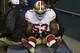 San Francisco 49ers' NaVorro Bowman is taken to the locker room on a cart after injuring his leg during the second half of the NFL football NFC Championship game against the Seattle Seahawks, Sunday, Jan. 19, 2014, in Seattle. (AP Photo/Marcio Jose Sanchez)