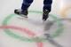 SOCHI, RUSSIA - FEBRUARY 03: A member of the United States women's ice hockey team skates over the Olympic rings logo during a practice session ahead of the Sochi 2014 Winter Olympics at Shayba Arena on February 3, 2014 in Sochi, Russia. (Photo by Bruce Bennett/Getty Images)
