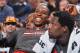 PHILADELPHIA, PA - NOVEMBER 13: Dwight Howard #12 of the Houston Rockets has a laugh on the bench during the game against the Philadelphia 76ers at the Wells Fargo Center on November 13, 2013 in Philadelphia, Pennsylvania. NOTE TO USER: User expressly acknowledges and agrees that, by downloading and or using this photograph, User is consenting to the terms and conditions of the Getty Images License Agreement. Mandatory Copyright Notice: Copyright 2013 NBAE (Photo by Jesse D. Garrabrant/NBAE via Getty Images)