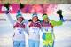 SOCHI, RUSSIA - FEBRUARY 11: (L-R) Silver medalist Ingvild Flugstad Oestberg of Norway, gold medalist Maiken Caspersen Falla of Norway and bronze medalist Vesna Fabjan of Slovenia celebrate on the podium during the flower ceremony for the Finals of the Ladies' Sprint Free during day four of the Sochi 2014 Winter Olympics at Laura Cross-country Ski & Biathlon Center on February 11, 2014 in Sochi, Russia. (Photo by Harry How/Getty Images)