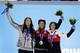 Women's freestyle skiing slopestyle medalists, from left, Devin Logan of the United States, silver, Canada's Dara Howell, gold, and Canada's Kim Lamarre, bronze, pose with their medals at the 2014 Winter Olympics in Sochi, Russia, Tuesday, Feb. 11, 2014. (AP Photo/Morry Gash)