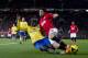 Manchester United's Shinji Kagawa, right, fights for the ball against Arsenal's Bacary Sagna during their English Premier League soccer match at Old Trafford Stadium, Manchester, England, Saturday Nov. 10, 2013. (AP Photo/Jon Super)