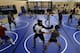 Fighters train at Fight Club Proving Ground gym in Waterford, March 6, 2013. Michigan lawmakers are pushing for legislation to regulate amateur mixed martial arts to protect fighters from injury and disease. When the sport was legalized in 2007, the professional bouts became regulated, but the amateurs were overlooked. Lawmakers and fighters say it's created a system in Michigan where anything goes. (AP Photo/Paul Sancya)