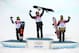 SOCHI, RUSSIA - FEBRUARY 11: (L-R) Silver medalist Ayumu Hirano of Japan, gold medalist Iouri Podladtchikov of Switzerland and bronze medalist Taku Hiraoka of Japan celebrate on the podium during the flower ceremony for the Snowboard Men's Halfpipe Finals on day four of the Sochi 2014 Winter Olympics at Rosa Khutor Extreme Park on February 11, 2014 in Sochi, Russia. (Photo by Al Bello/Getty Images)
