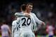 MADRID, SPAIN - FEBRUARY 05: Jese Rodriguez (L) of Real Madrid CF celebrates scoring their second goal with team mate Cristiano Ronaldo (R) during the Copa del Rey semifinal first leg match between Real Madrid CF and Club Atletico Madrid at Estadio Santiago Bernabeu on February 5, 2014 in Madrid, Spain. (Photo by Gonzalo Arroyo Moreno/Getty Images)