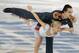 Tatiana Volosozhar and Maxim Trankov of Russia compete in the pairs short program figure skating competition at the Iceberg Skating Palace during the 2014 Winter Olympics, Tuesday, Feb. 11, 2014, in Sochi, Russia. (AP Photo/Ivan Sekretarev)