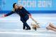 SOCHI, RUSSIA - FEBRUARY 11: Tatiana Volosozhar and Maxim Trankov of Russia compete during the Figure Skating Pairs Short Program on day four of the Sochi 2014 Winter Olympics at Iceberg Skating Palace on February 11, 2014 in Sochi, Russia. (Photo by Paul Gilham/Getty Images)