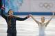 Tatiana Volosozhar and Maxim Trankov of Russia compete in the pairs short program figure skating competition at the Iceberg Skating Palace during the 2014 Winter Olympics, Tuesday, Feb. 11, 2014, in Sochi, Russia. (AP Photo/Ivan Sekretarev)