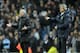 Manchester City's manager Manuel Pellegrini, right, and Chelsea's manager Jose Mourinho during their English Premier League soccer match at the Etihad stadium in Manchester, England, Monday Feb. 3, 2014. (AP Photo/Clint Hughes)