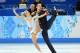 Feb 6, 2014; Sochi, RUSSIA; Tatiana Volosozhar and Maxim Trankov (RUS) perform in the figure skating team pairs short program during the Sochi 2014 Olympic Winter Games at Iceberg Skating Palace. Mandatory Credit: Robert Deutsch-USA TODAY Sports