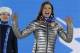 Women's super combined bronze medalist Julia Mancuso of the United States waves during the medals ceremony at the 2014 Winter Olympics, Monday, Feb. 10, 2014, in Sochi, Russia. (AP Photo/Morry Gash)