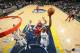 MEMPHIS, TN - FEBRUARY 11: Zach Randolph #50 of the Memphis Grizzlies goes up for the layup against the Washington Wizards on February 11, 2014 at FedExForum in Memphis, Tennessee. NOTE TO USER: User expressly acknowledges and agrees that, by downloading and or using this photograph, User is consenting to the terms and conditions of the Getty Images License Agreement. Mandatory Copyright Notice: Copyright 2014 NBAE (Photo by Joe Murphy/NBAE via Getty Images)