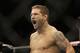 Chad Mendes back flips while celebrating after beating Darren Elkins during the first round of a UFC featherweight mixed martial arts fight in San Jose, Calif., Saturday, April 20, 2013. Mendes won by technical knock out in the first round. (AP Photo/Jeff Chiu)