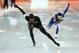 SOCHI, RUSSIA - FEBRUARY 10: Shani Davis (L) of the United States competes during the Men's 500 m Race 1 of 2 Speed Skating event during day 3 of the Sochi 2014 Winter Olympics at Adler Arena Skating Center on February 10, 2014 in Sochi, Russia. (Photo by Quinn Rooney/Getty Images)