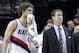 Portland Trail Blazers center Robin Lopez, left, and coach Terry Stotts watch as they lose the review on an out-of-bounds call late in the second half of an NBA basketball game against the Oklahoma City Thunder in Portland, Ore., Tuesday, Feb. 11, 2014. The Thunder won 98-95. (AP Photo/Don Ryan)