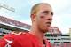 TAMPA, FL - DECEMBER 8: Quarterback Mike Glennon #8 of the Tampa Bay Buccaneers leaves the field after play against the Buffalo Bills December 8, 2013 at Raymond James Stadium in Tampa, Florida. The Buxs won 27 - 6. (Photo by Al Messerschmidt/Getty Images)