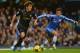 LONDON, ENGLAND - OCTOBER 27: David Silva of Manchester City is marshalled by Eden Hazard of Chelsea during the Barclays Premier League match between Chelsea and Manchester City at Stamford Bridge on October 27, 2013 in London, England. (Photo by Shaun Botterill/Getty Images)
