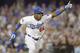Los Angeles Dodgers' Yasiel Puig reacts after hitting an RBI triple during the fourth inning of Game 3 of the National League baseball championship series against the St. Louis Cardinals Monday, Oct. 14, 2013, in Los Angeles. (AP Photo/Mark J. Terrill)