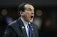 Duke head coach Mike Krzyzewski shouts instructions to his team playing the defensive boards during the first half of their NCAA college basketball game against the Boston College on Boston College campus in Boston, Saturday, Feb. 8, 2014. (AP Photo/Stephan Savoia)