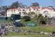 The majestic clubhouse sits above the 18th green at Riviera Country Club.