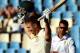 Australia's batsman Shaun Marsh, left, celebrates his century as South Africa's bowler JP Duminy, right, looks on, on the first day of their their cricket test match at Centurion Park in Pretoria, South Africa, Wednesday, Feb. 12, 2014. (AP Photo/Themba Hadebe)