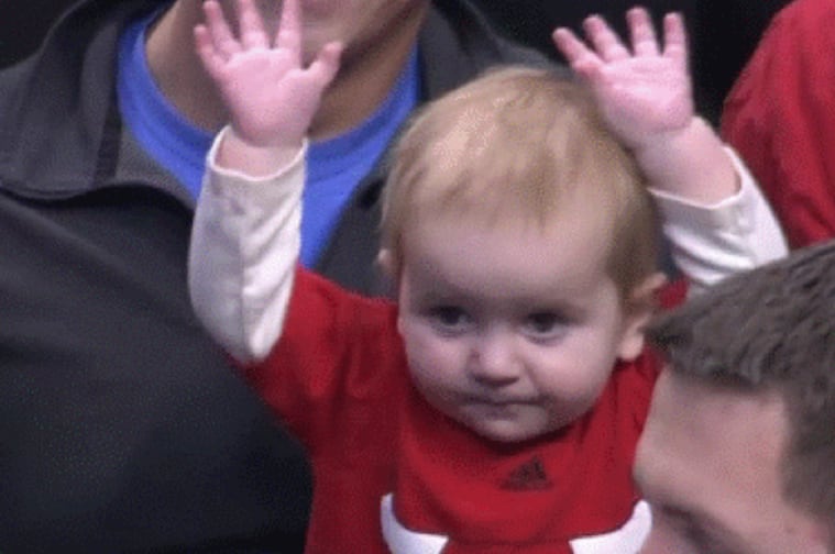 Baby Dances with Hands in the Air at Chicago Bulls Game