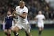 England's Luther Burrell runs to score a try, during his Six Nations rugby union international match against France, at the Stade de France, in Saint Denis, outside Paris, Saturday, Feb. 1, 2014. (AP Photo/Thibault Camus)