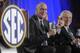 ESPN President John Skipper, left, and Southeastern Conference Commissioner Mike Slive address the media during a news conference announcing the launching of the SEC Network in partnership with ESPN, held Thursday, May 2, 2013, in Atlanta. (AP Photo/John Amis)
