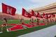 Nebraska cheerleaders run with flags at Memorial Stadium after a score against Southern Mississippi in the first half of an NCAA college football game in Lincoln, Neb., Saturday, Sept. 7, 2013. (AP Photo/Nati Harnik)