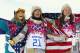 From left, silver medalist Australia's Torah Bright, gold medalist United States' Kaitlyn Farrington and bronze medalist United States' Kelly Clark pose following the women's snowboard halfpipe at the Rosa Khutor Extreme Park, at the 2014 Winter Olympics, Wednesday, Feb. 12, 2014, in Krasnaya Polyana, Russia.(AP Photo/Sergei Grits)