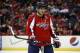 Washington Capitals right wing Alex Ovechkin (8), from Russia, skates on the ice in the first period of an NHL hockey game against the Detroit Red Wings, Sunday, Feb. 2, 2014, in Washington. (AP Photo/Alex Brandon)