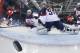 Goalkeeper Jessie Vetter and Kendall Coyne (26) of the United States look back at the puck as Meghan Agosta-Marciano, left, of Canada celebrates her goal during women's ice hockey game at the 2014 Winter Olympics, Wednesday, Feb. 12, 2014, in Sochi, Russia. Canada defeated the United States 3-2. (AP Photo/Matt Slocum, Pool)