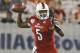 Louisville quarterback Teddy Bridgewater throws a pass during the first half of the Russell Athletic Bowl NCAA college football game against Miami in Orlando, Fla., Saturday, Dec. 28, 2013.(AP Photo/John Raoux)