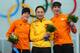 SOCHI, RUSSIA - FEBRUARY 13: (L-R) Silver medalist Ireen Wust of the Netherlands, gold medalist Hong Zhang of China and bronze medalist Margot Boer of the Netherlands celebrate on the podium during the flower ceremony for the Speed Skating Women's 1000m event on day 6 of the Sochi 2014 Winter Olympics at Adler Arena Skating Center on February 13, 2014 in Sochi, Russia. (Photo by Quinn Rooney/Getty Images)