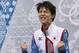 Yuzuru Hanyu of Japan reacts as he receives his results after competing in the men's short program figure skating competition at the Iceberg Skating Palace during the 2014 Winter Olympics, Thursday, Feb. 13, 2014, in Sochi, Russia. (AP Photo/Ivan Sekretarev)