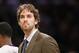 Los Angeles Lakers' Pau Gasol of Spain, who is injured, looks on against the Utah Jazz during the second half of an NBA basketball game in Los Angeles, Tuesday, Feb. 11, 2014. The Jazz won 96-79. (AP Photo/Danny Moloshok)