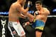 Feb 23, 2013; Anaheim, CA, USA; Dan Henderson (blue gloves) fights Lyoto Machida (red gloves) during their UFC welterweight bout at the Honda Center. Mandatory Credit: Jayne Kamin-Oncea-USA TODAY Sports