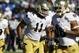 Notre Dame linebacker Ishaq Williams warms up before facing Air Force in the first quarter of an NCAA football game at the Air Force Academy, Colo., on Saturday, Oct. 26, 2013. (AP Photo/David Zalubowski)