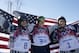Men's ski slopestyle medalists from the United States Gus Kenworthy, left, silver, Joss Christensen, center, gold, and Nicholas Goepper, bronze, right, pose for photographers at the Rosa Khutor Extreme Park, at the 2014 Winter Olympics, Thursday, Feb. 13, 2014, in Krasnaya Polyana, Russia.(AP Photo/Gero Breloer)